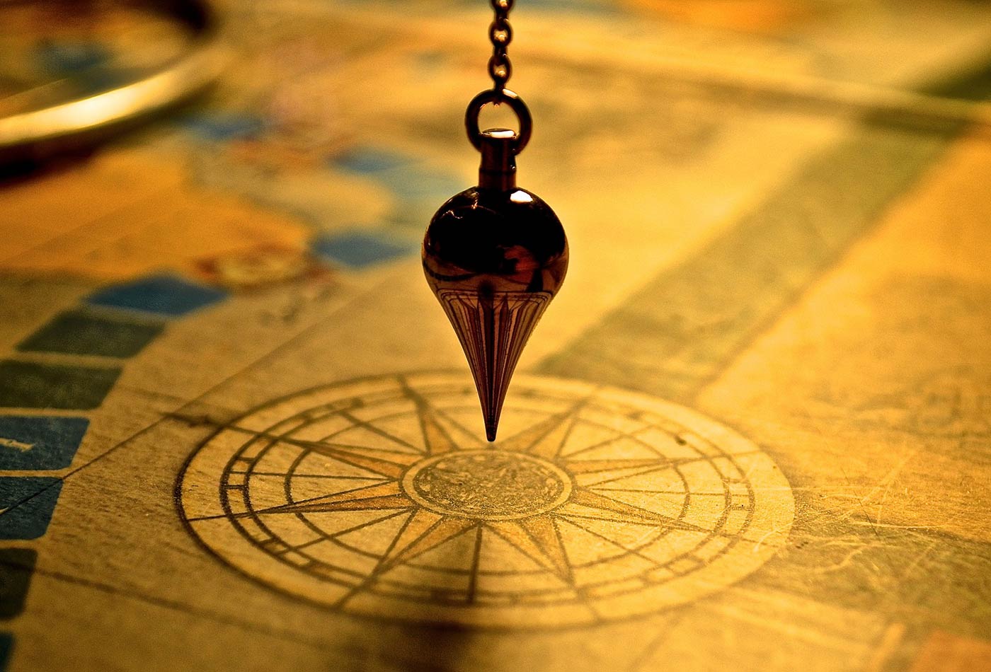 Swinging Between Worlds: The Pendulum as a Tool for Spiritual Communication